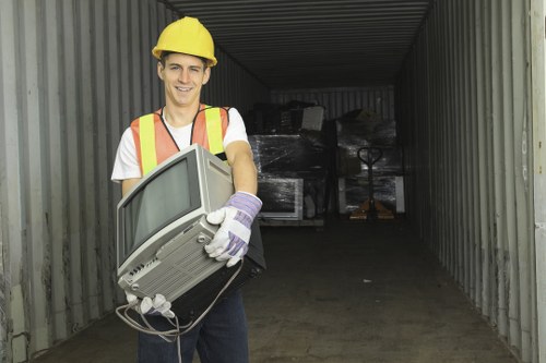 Recycling bins and sorted waste materials in a Shoreditch office